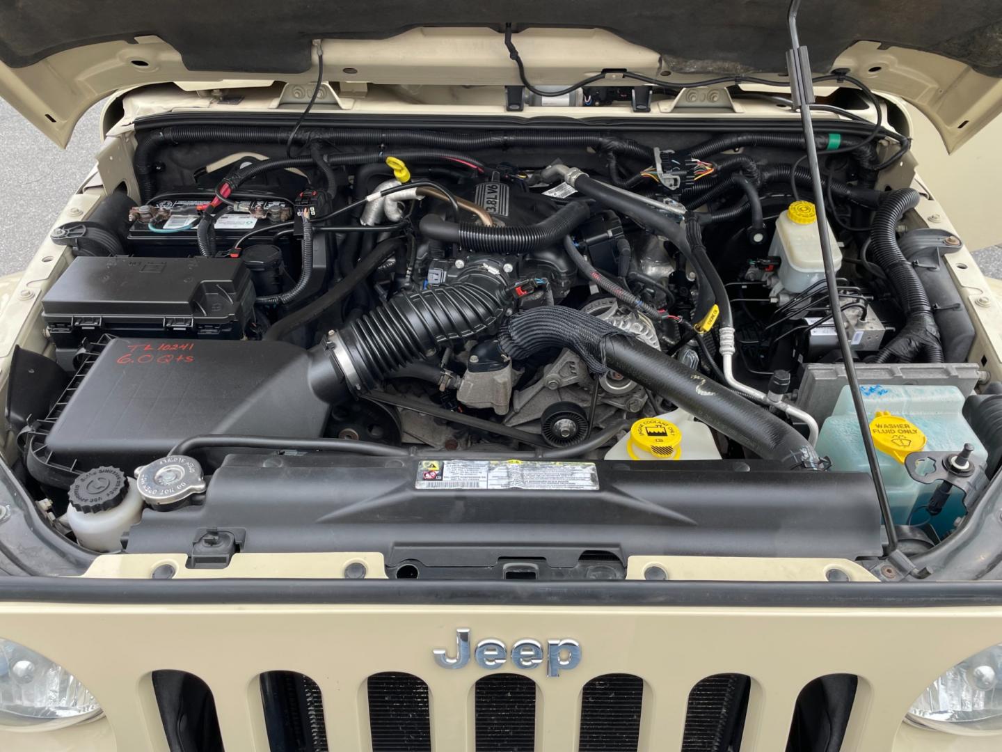 2011 Jeep Wrangler Unlimited Sahara 4WD (1J4BA5H11BL) with an 3.8L V6 OHV 12V engine, located at 101 N. Main Street, Muncy, PA, 17756, (570) 546-5462, 41.207691, -76.785942 - Photo#10